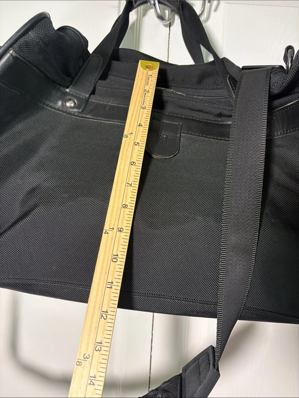 Hartmann zip around nylon and leather duffle style bag.